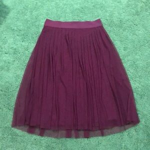Cherry red knee length pleated skirt